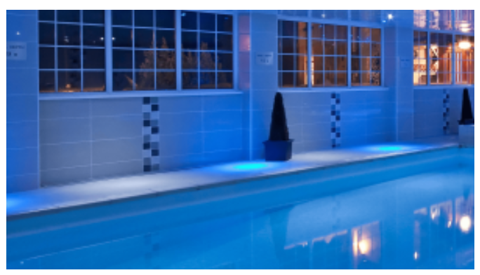 Illuminated leisure pool at Old Mill Hotel